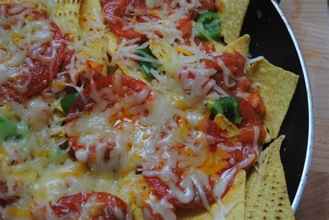 Scatter pepperoni slices over top. Pizza nachos: The ultimate nachos recipe how to - Student ...