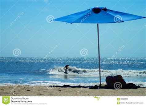 Surfer Boy Carving A Wave At Beach In Outer Banks Of Nc Stock Image