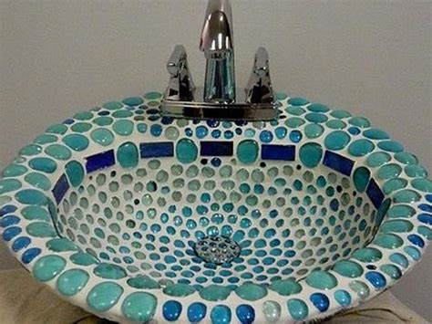 Don't settle for a dull bathroom floor. Beautiful Bathroom Sinks Decorated with Mosaic Tiles