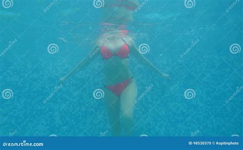 Woman Underwater A Woman With Big Breasts Floating Under The Water