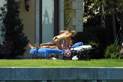 Anna Kournikova Sunbathing Topless In Backyard 3