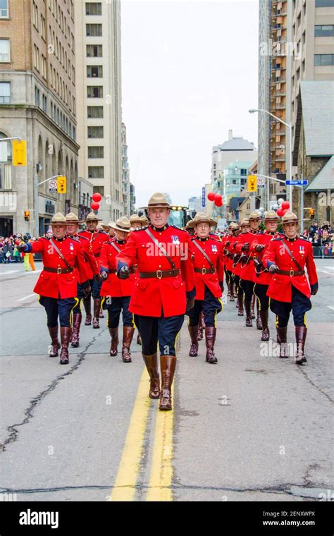 Canadian Mounted Police Or Mounties Marching In The Celebration Of The