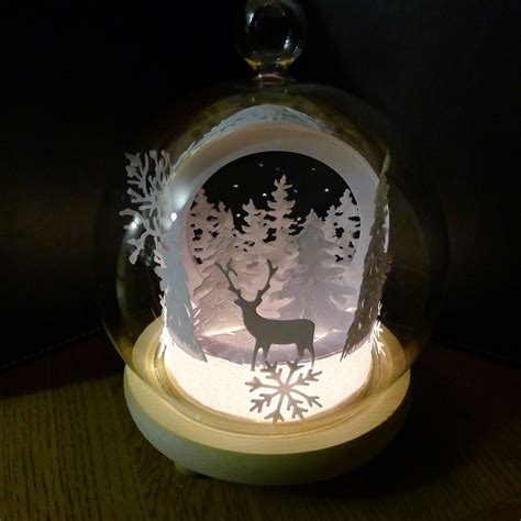 The Other Side Of The 3d Papercut Christmas Scene In A Glass Snowglobe