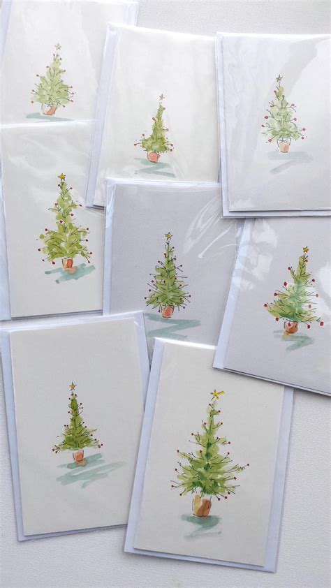 Six Cards With Christmas Trees On Them