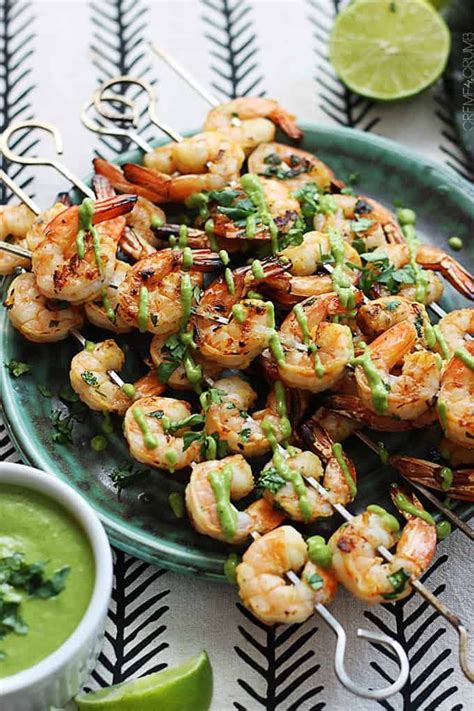 Ideal for a cocktail buffet, these appetizer shrimp are marinated for only 30 minutes and quite flavorful without any sauce. Cilantro lime marinated grilled shrimp topped with a spicy ...