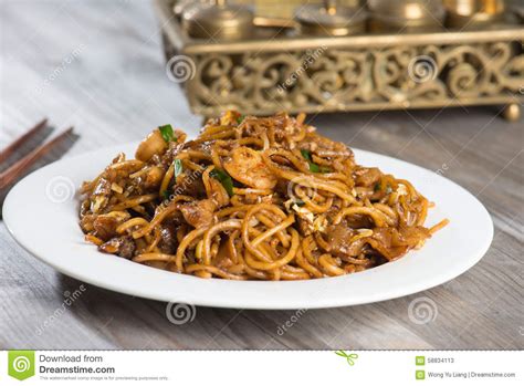 Of all the versions of this favourite hawker dish, the penang style is the most famous; Fried Penang Char Kuey Teow Stock Image - Image of asian ...