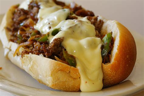 This philly cheesesteak recipe is a classic combination of thinly sliced steak and melted cheese in a soft and crusty roll. Slow Cooker Philly Cheese Steak Sandwiches - The Cooking Mom