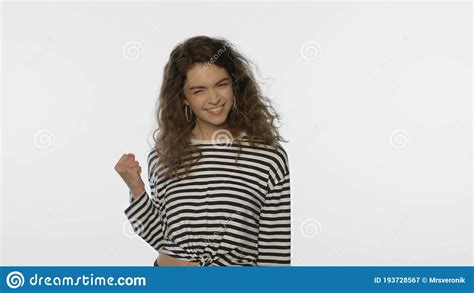 Young Woman Yes Gesture In Studio Portrait Of Happy Girl Celebrating