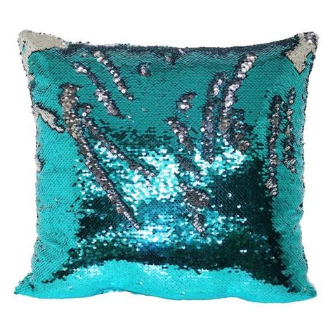 A Blue Pillow With Silver Sequins On The Bottom And Green Square