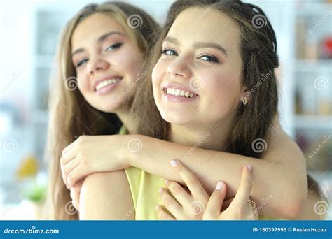 Portrait Of Young Women Posing At Home Stock Photo Image Of People