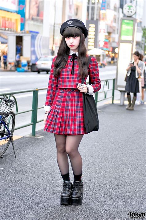 harajuku girl in plaid honey cinnamon dress and platform shoes japanese street fashion tokyo
