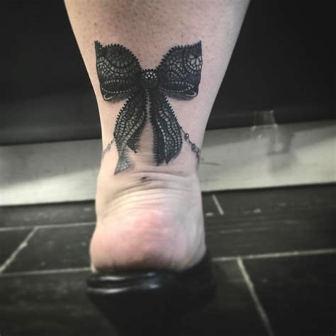 Bow Tattoo On The Back Of The Leg With Charms Upfront Such A Cute Idea