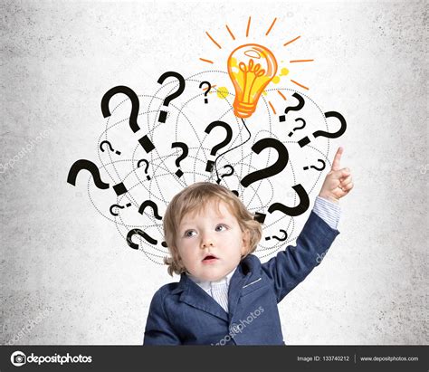 Baby Boy And Question Marks On Concrete Wall Stock Photo By
