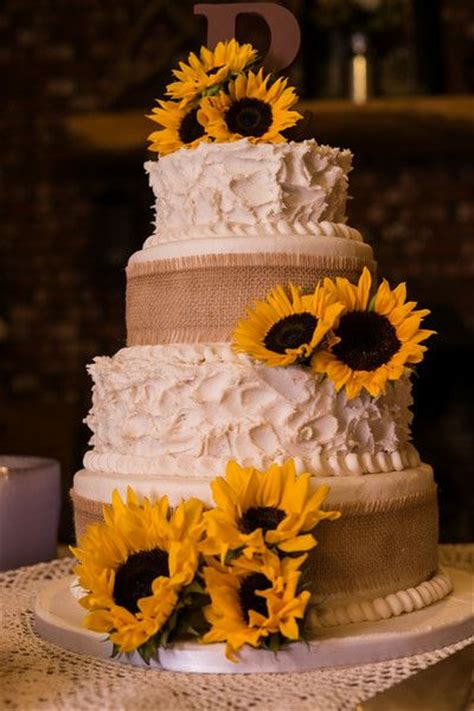 Sunflower wedding bouquets add a burst of color to your wedding day! My wedding Cake! Buttercream frosting, burlap, fresh ...
