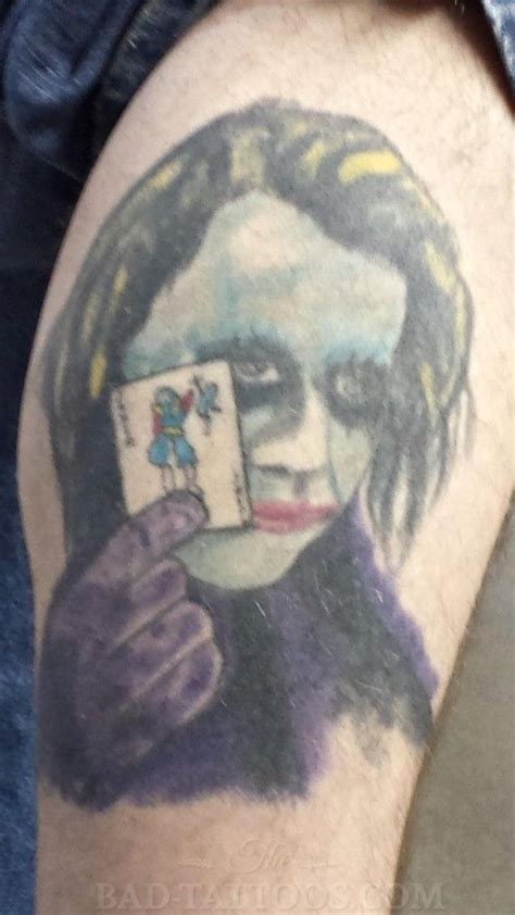 He's spinning a basketball, and it has his nike shoe logo — also featuring a jester's hat — next to the caricature. Dark Knight Joker Card Tattoo Designs - Best Tattoo Ideas