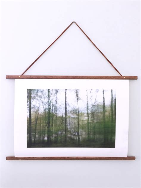 Give someone a gift card. Hang Your Favorites With These 22 DIY Poster Frames!