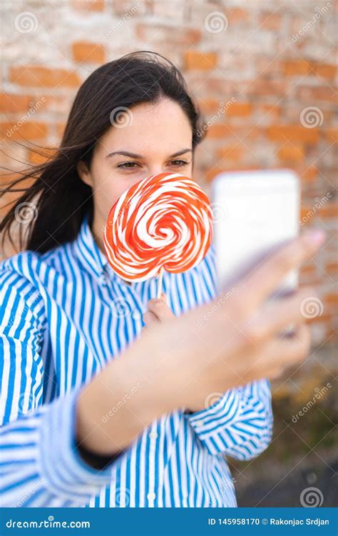 Young Female With Lollipop Making Selfie Girl Having Fun Outside