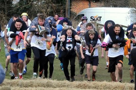 Crowds Gathered To Watch 10th Uk Wife Carrying Championships In Dorking