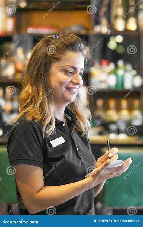 Smiling Waitress Taking An Order In A Restaurant Stock Photo Image Of