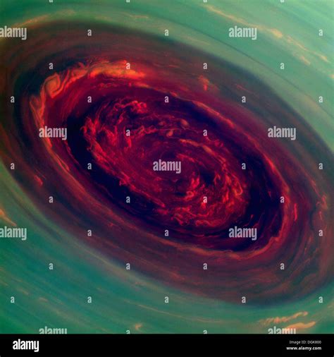 The Spinning Vortex Of Saturns North Polar Storm Stock Photo Alamy