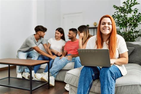 Group Of Young Friends Speaking Sitting On The Sofa Stock Image Image