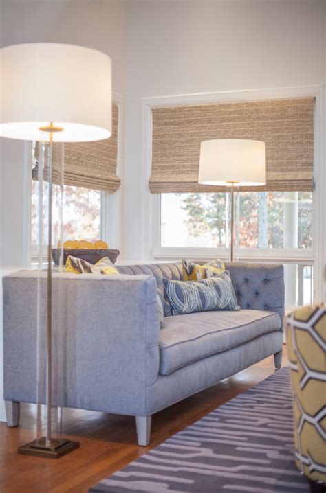 Two floor lamps behind sofa the lamp x 2 emily a clark. Gray Tufted Sofa - Contemporary - living room - Lucy and Company