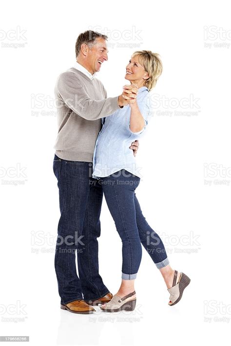Happy Mature Couple Dancing On White Stock Photo Download Image Now