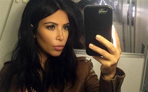 Kim Kardashian Taking A Selfie For Her 2015 Book Selfish Image