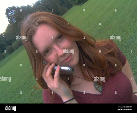 Attractive Auburn Haired Woman On Her Cell Phone At Earlham College