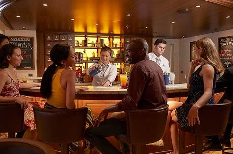 Guest Having A Good Time At The Alchemy Bar Onboard Carnival Vista As A