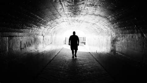 850 Lone Man Walking Through Tunnel Stock Photos Pictures And Royalty