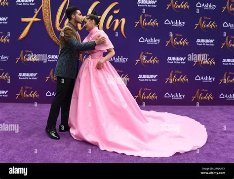 Mena Massoud Left Kisses Naomi Scott As They Arrive At The Premiere Of Aladdin On Tuesday