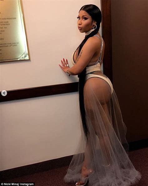 Nicki Minaj Shows Off Her Cleavage And Her Derriere In A Bodysuit