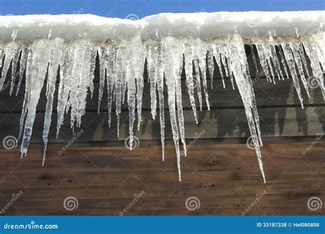 Icicles Hanging From Roof Stock Photo Image Of Long 33187338