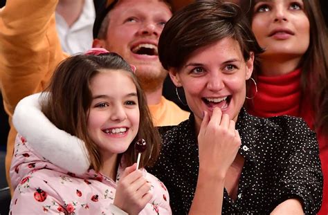 katie holmes says she and daughter suri cruise grew up together