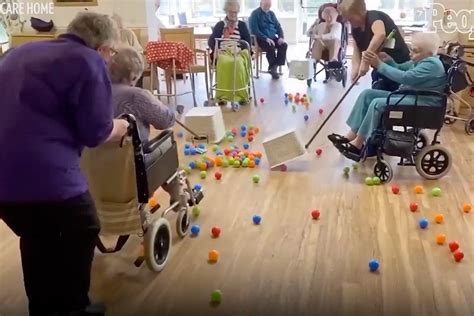 Nursing Home Residents Play Life Size Game Of Hungry Hungry Hippos