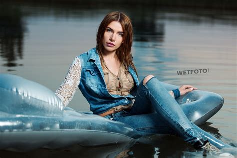 Swimming By Beautiful Girl In Wet Skinny Jeans Jacket Soaks And Sneakers Wetfoto Com