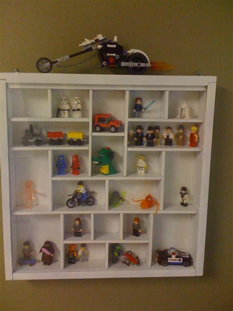 Hanging some paintings will be great, but exquisite paintings can cost an arm and a leg. DIY Lego mini figure display case | To Feed My OCD | Pinterest