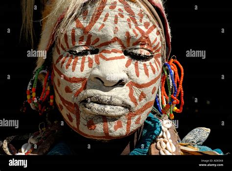 Portrait Of Kikuyu Tribeswoman With Traditionally Painted Face And