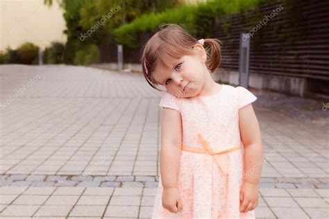 Beautiful Cute Little Girl With Sad Face — Stock Photo © Kinboris 77148503
