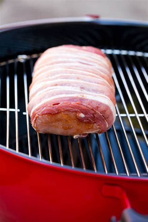 a bacon wrapped pork loin on a weber kettle grill bacon wrapped pork loin pork roast recipes