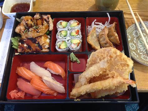 Bento Box Teriyaki Chicken Gyoza Tempura And Sushi Foodie Flair