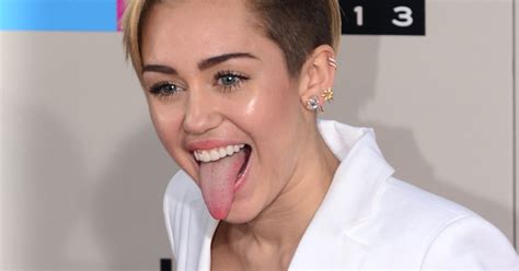 Miley Cyrus Shows Armpit Hair In Gorgeous Strapless Red Gown At Amfar