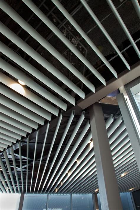 40 patterns & 50+ finishes. Metal Ceilings - High Profile Series from Hunter Douglas ...