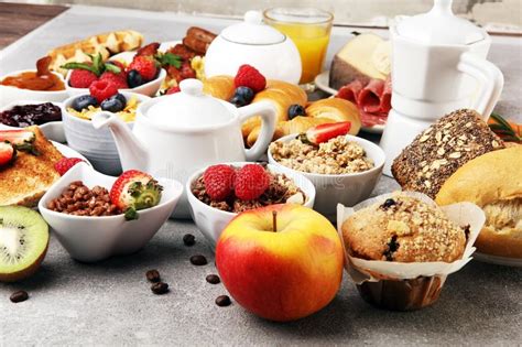 Breakfast Served With Coffee Orange Juice Croissants Cereals And