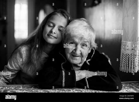 Old Lady Granny With Her Granddaughter Black And White Photo Stock