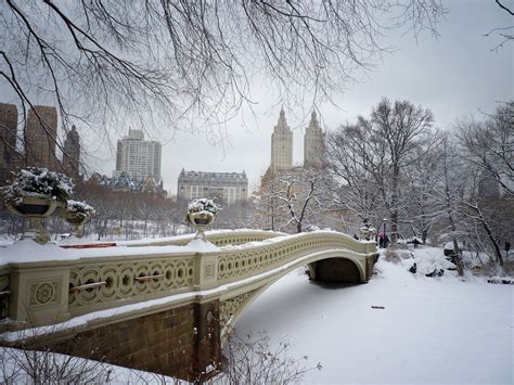 Bow Bridge In The Snow Central Park Winter New Ny Through The