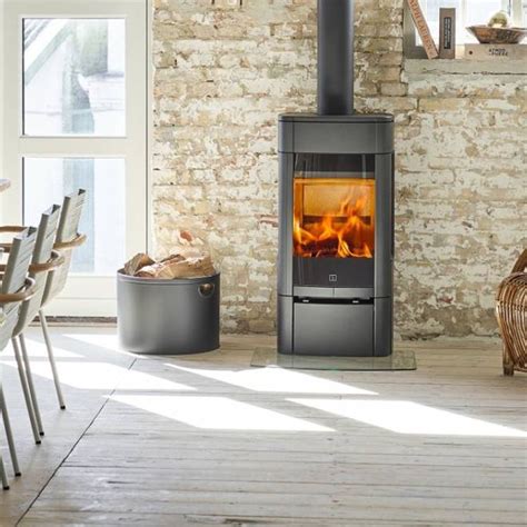 Verified wood burning stove companies such as arada will do the rest. Scan 65 is a medium-sized #stove with large #glass door providing a perfect view ...
