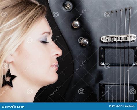 Rock Music Girl Musician Guitarist With Electric Guitar Stock Image