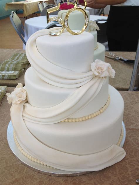 As mentioned in the previous post, when i saw this design lying on the counter of my cake supply shop, it was love at first sight! Decorations for 50th Wedding Anniversary Cakes | Wedding ...